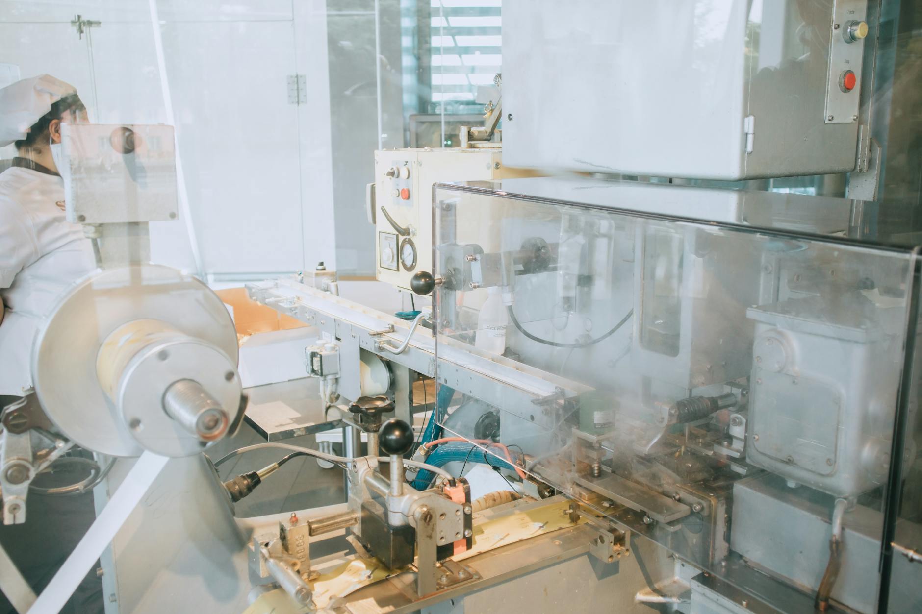 Close-up of advanced machinery in a modern laboratory setting, highlighting technology and industry.
